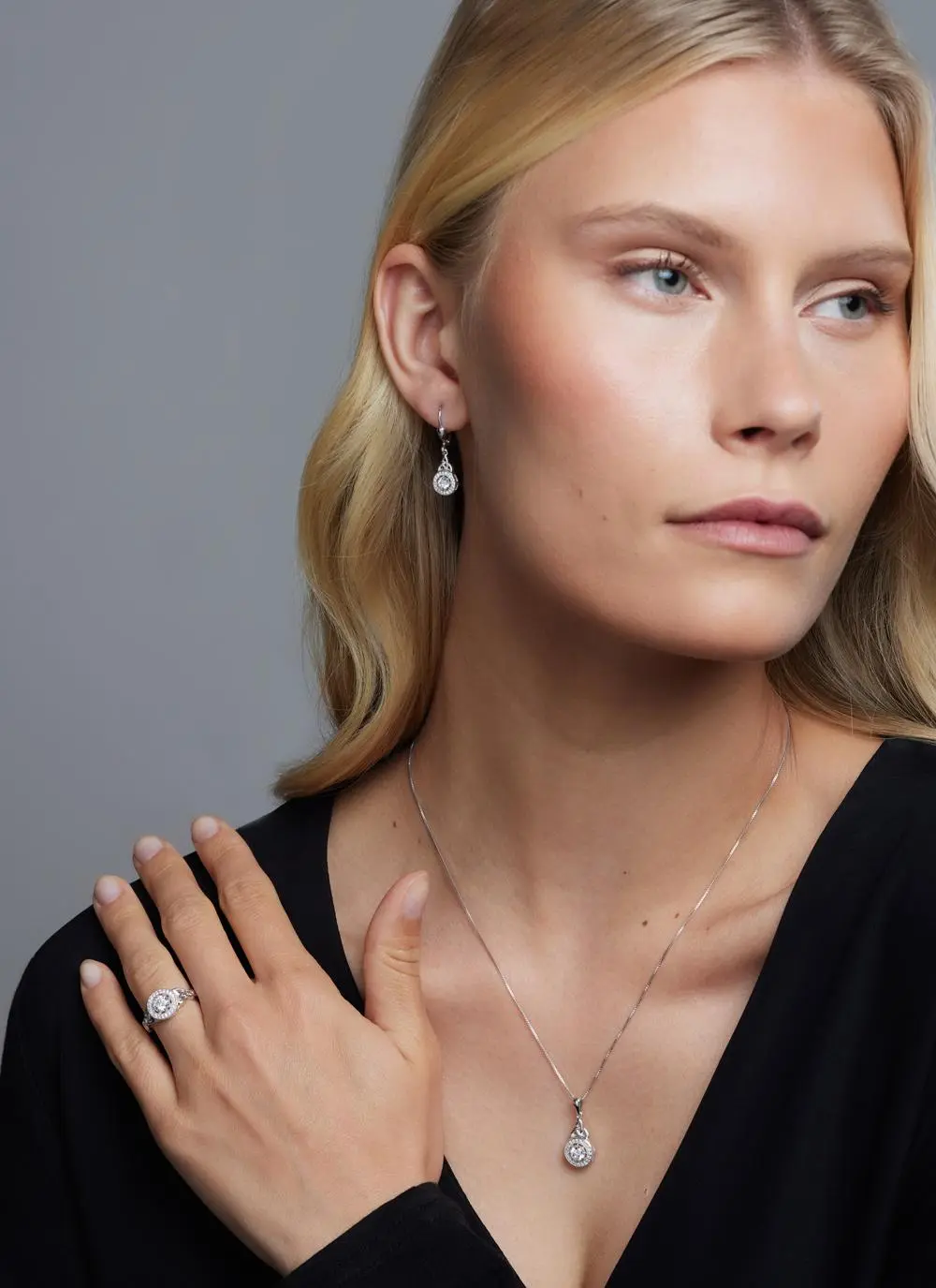 Sterling Silver Trinity Knot Halo Pendant with Cubic Zirconia