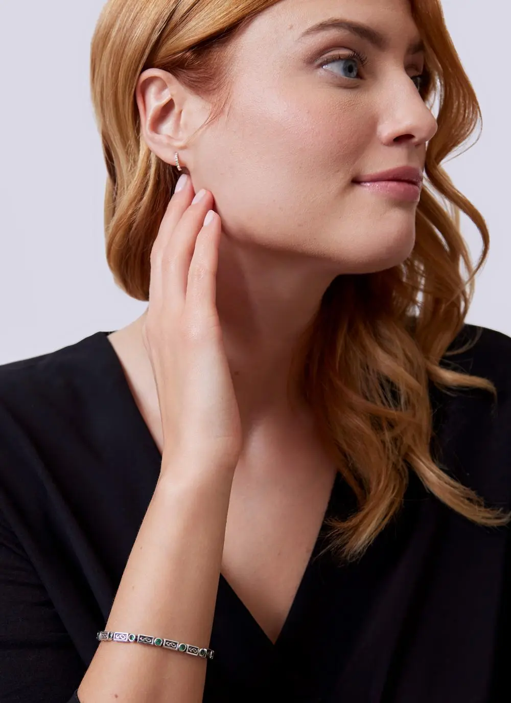 Sterling Silver Celtic Bracelet with Green Cubic Zirconia