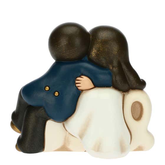 Large in love newlywed couple with Love lettering