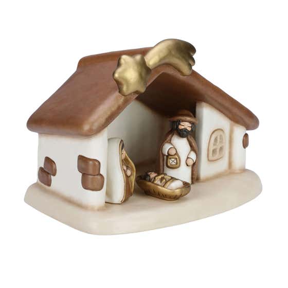 Stable set with shooting star and Holy Family with Jesus, Joseph and Mary