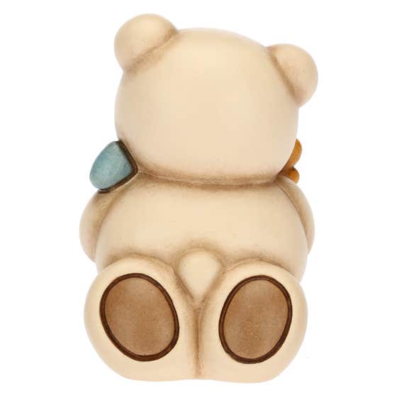 First Communion boy Teddy with ear of wheat