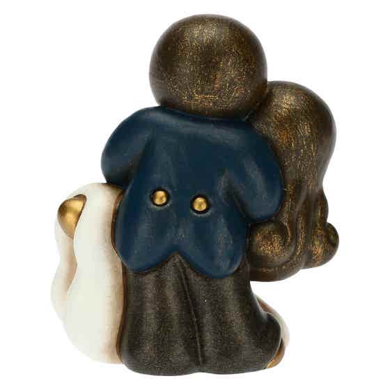 Small dancing newlywed couple