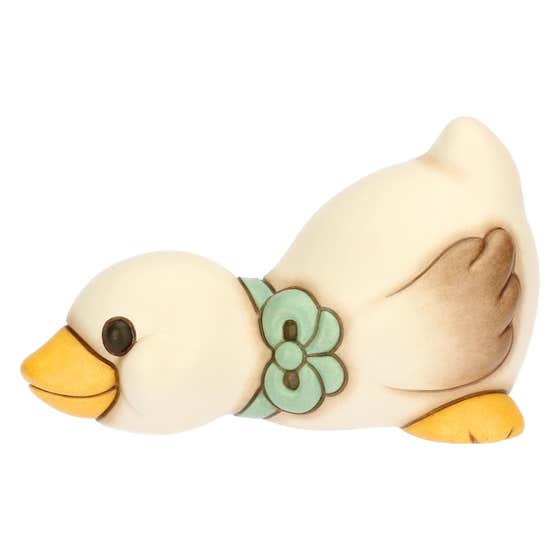Ceramic Julie goose with blue bow lying down