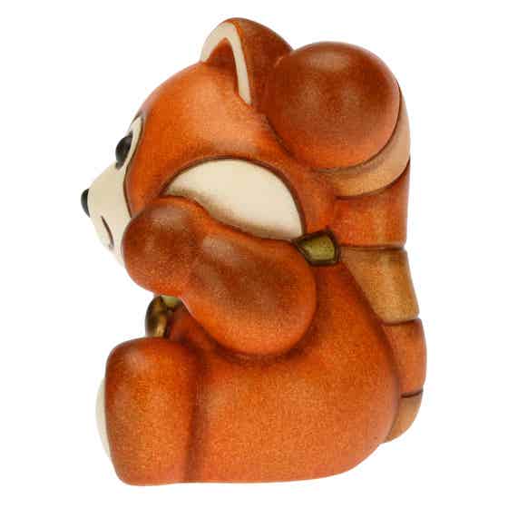 Mini red panda with lucky four-leaf clover