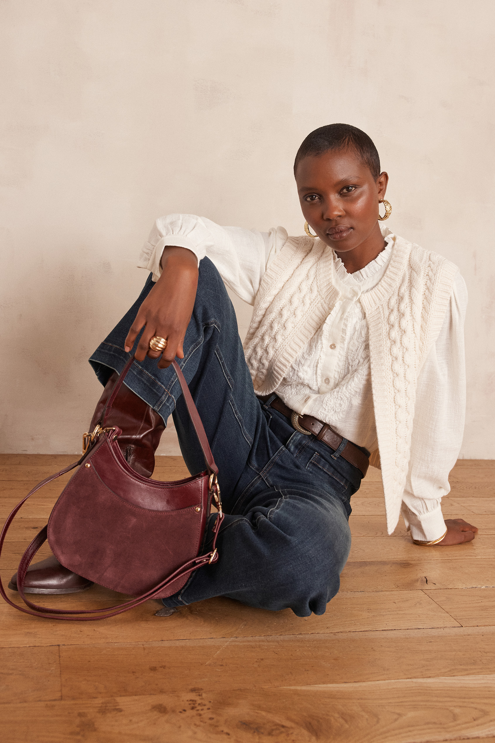 BIXENTE sleeveless cardigan in cable-knit wool