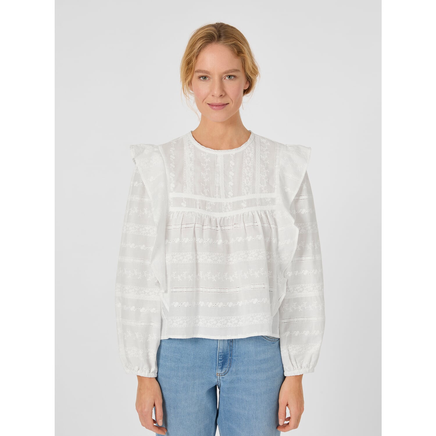 Women's embroidered blouse with flounces