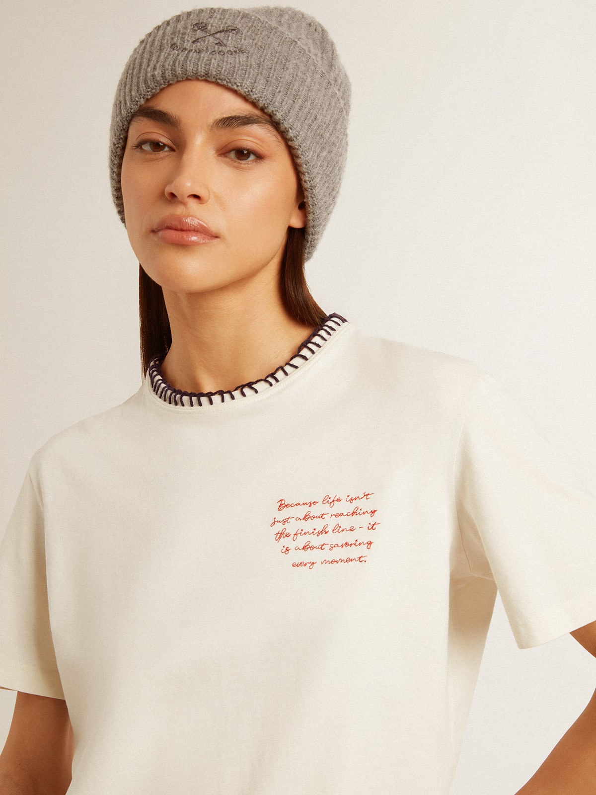 Women's aged white cotton T-shirt with hand embroidery