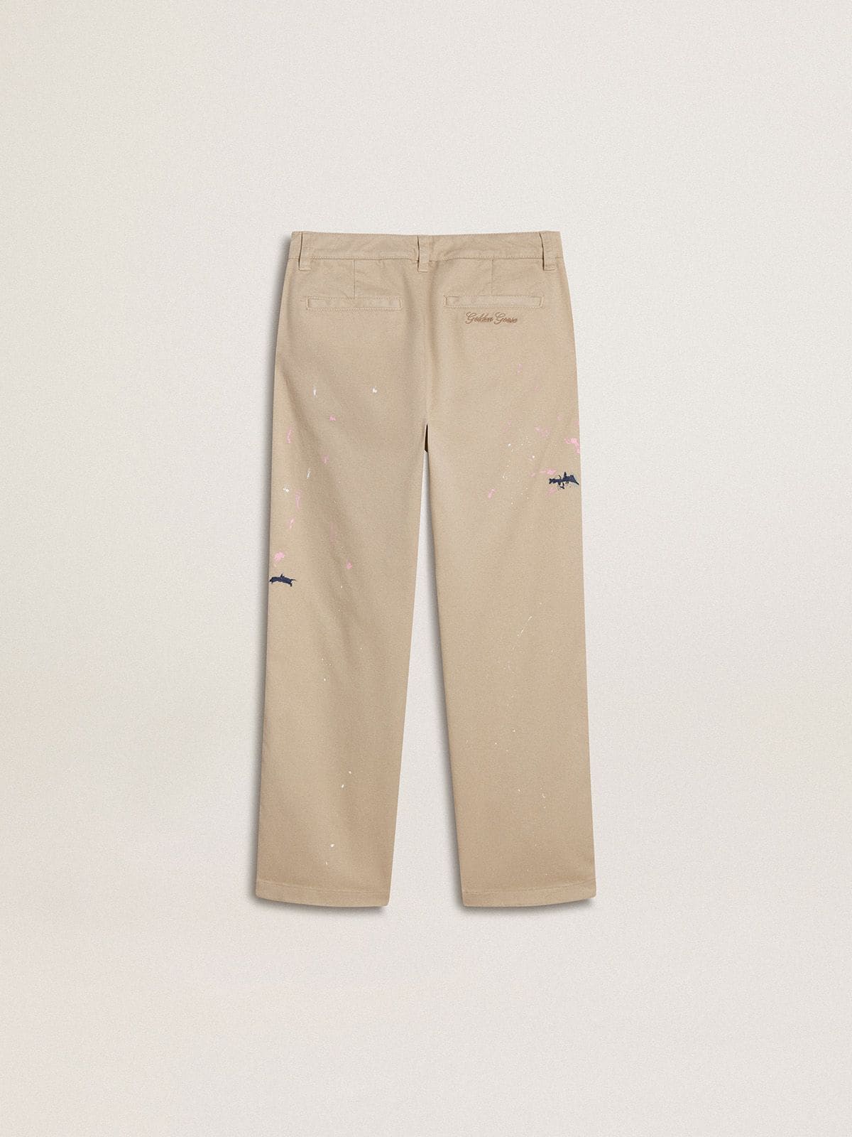 Kids' beige chino pants with multicolor splashes