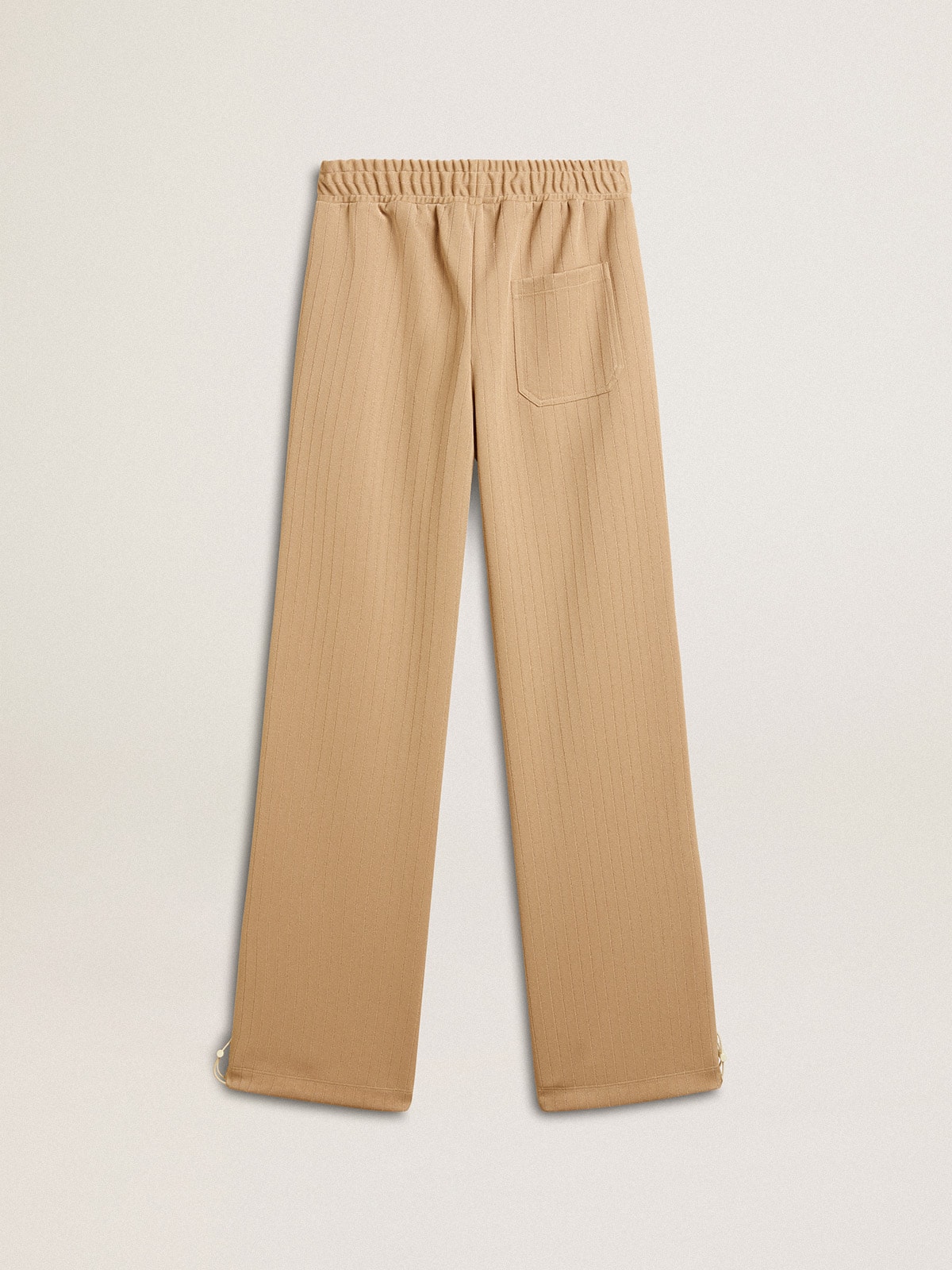Women's light beige joggers with white logo