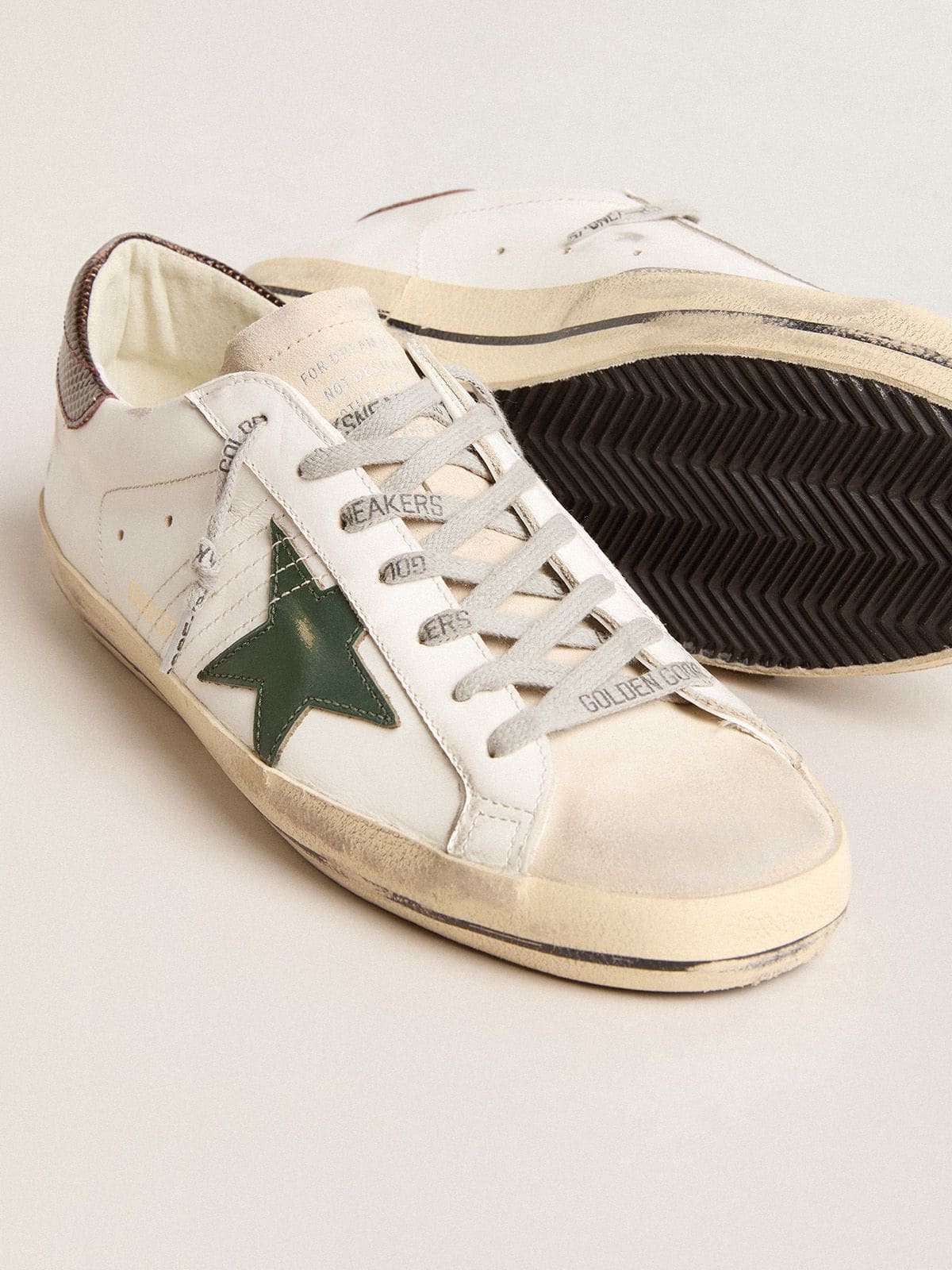 Men's Super-Star in white leather with green star and animal-print heel tab