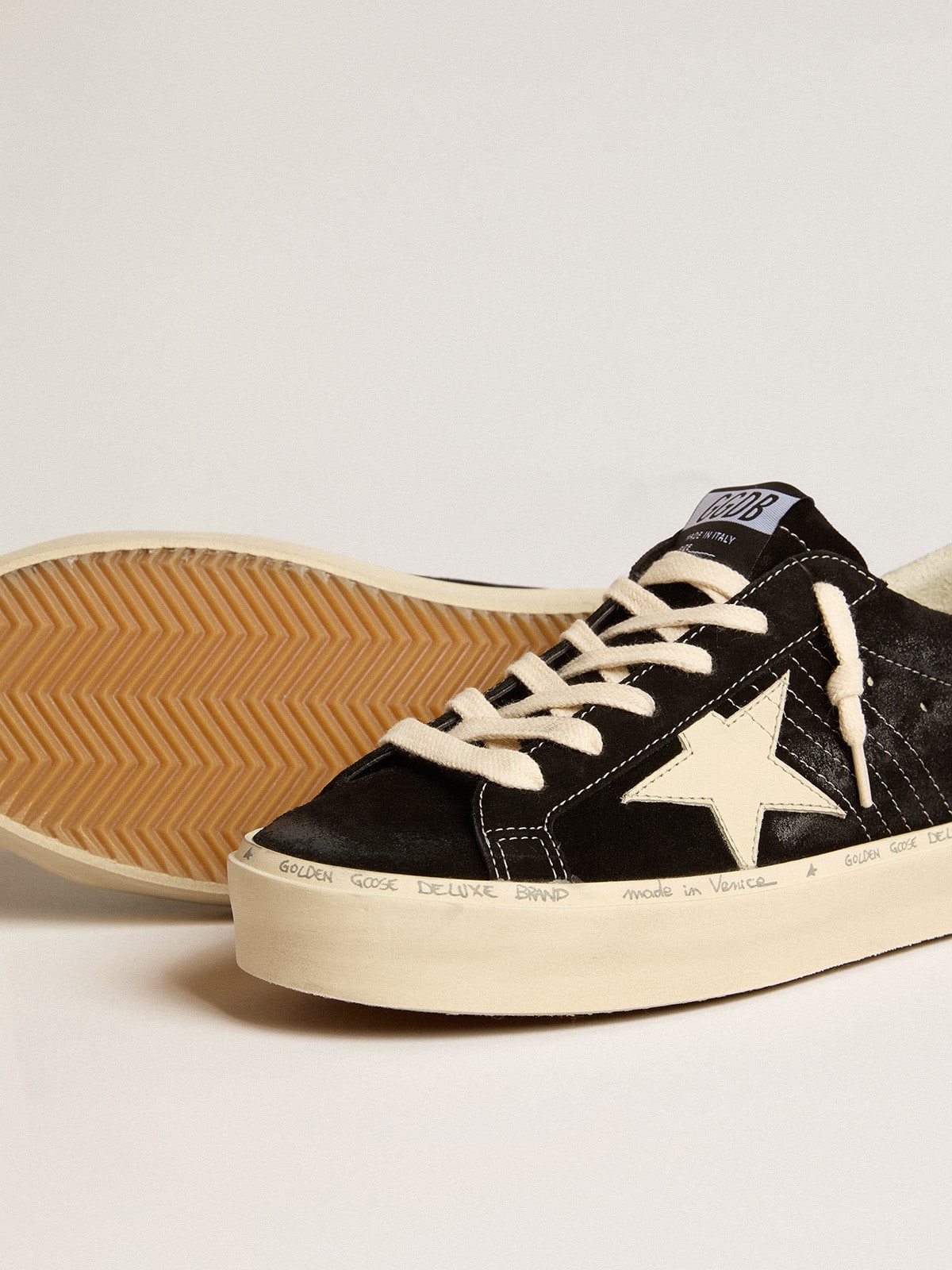 Women's Hi Star in black leather with silver glitter heel tab