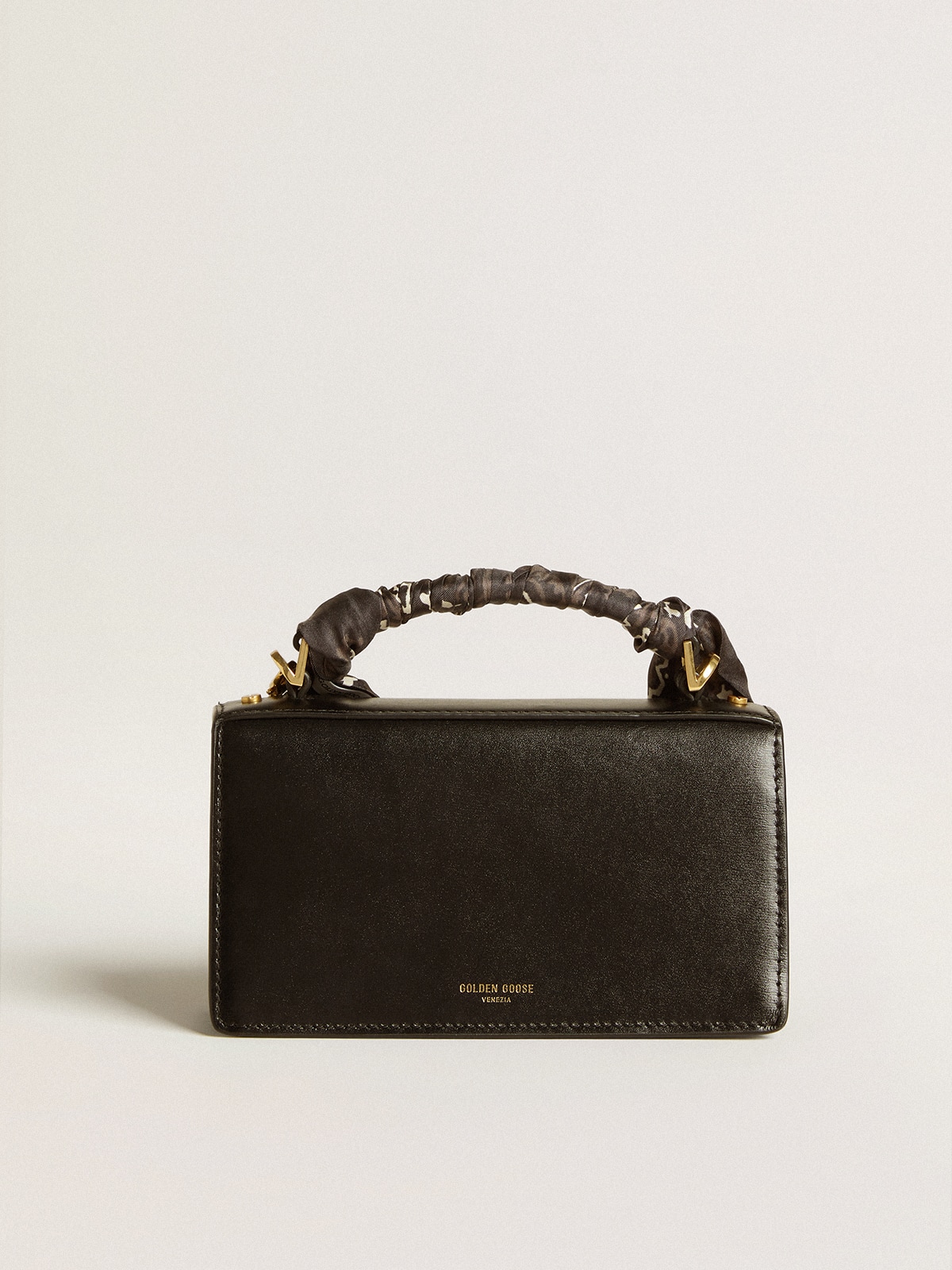 Small Venezia Bag in black boarded leather with silk scarf and charm