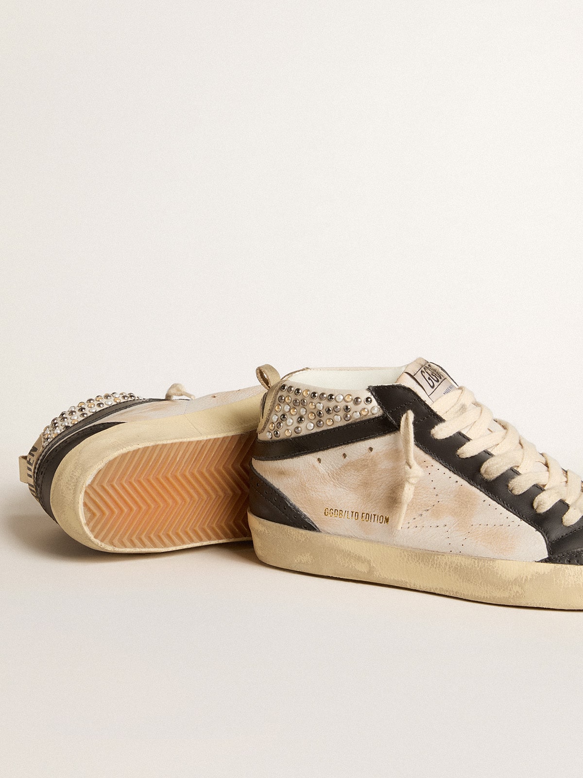 Women's Mid Star LTD in black and white leather with pearls and perforated star