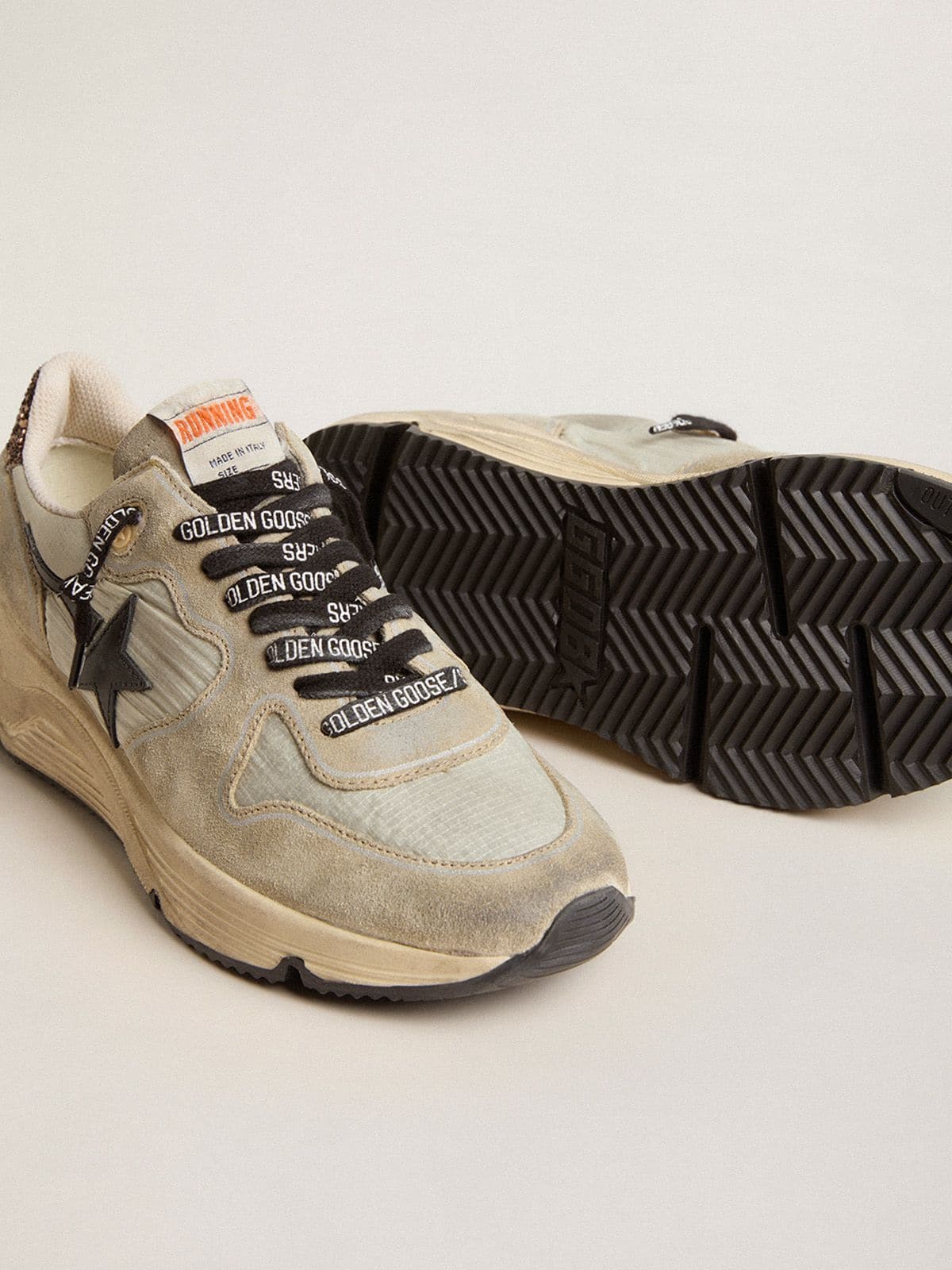 Women's Running Sole in gray nylon with black star and glitter heel tab