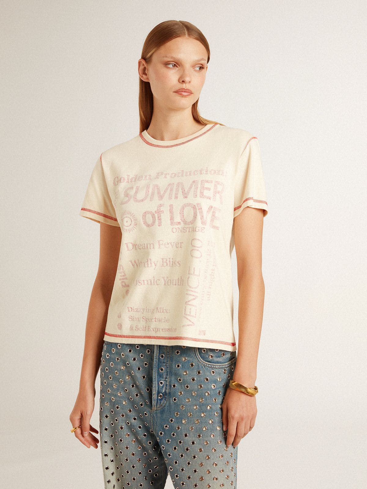 Women's cream T-shirt with faded red accents