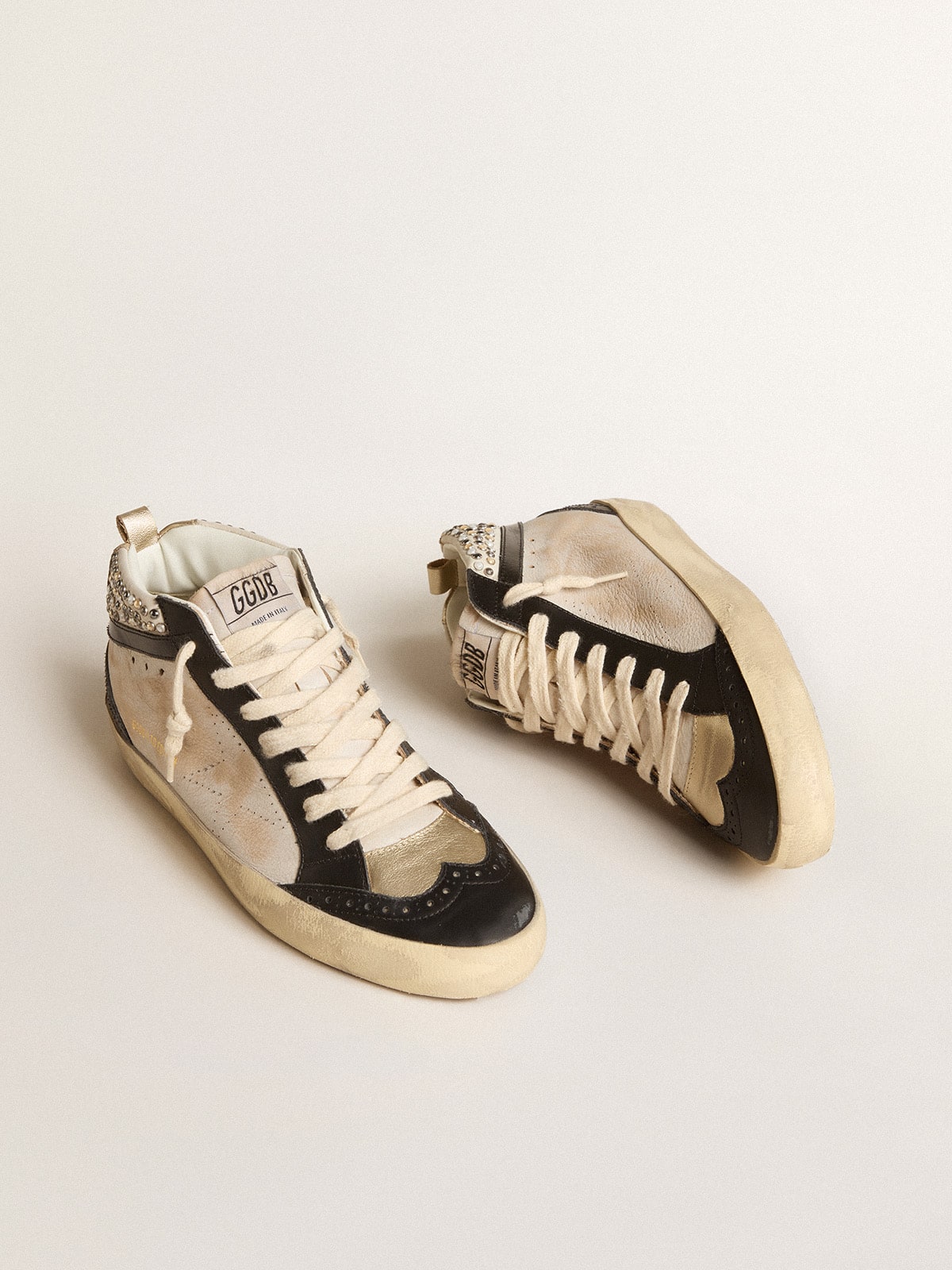 Women's Mid Star LTD in black and white leather with pearls and perforated star