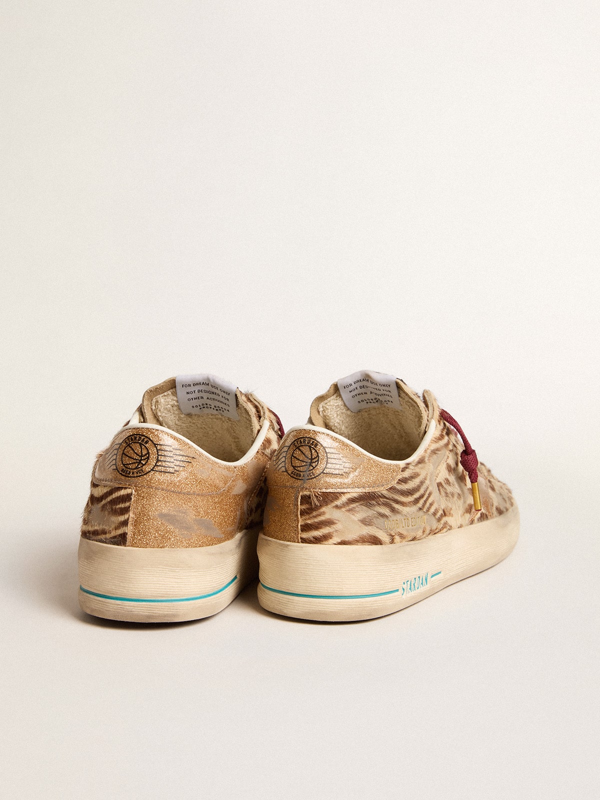 Women's Stardan LTD in animal-print pony skin with gold glitter star
