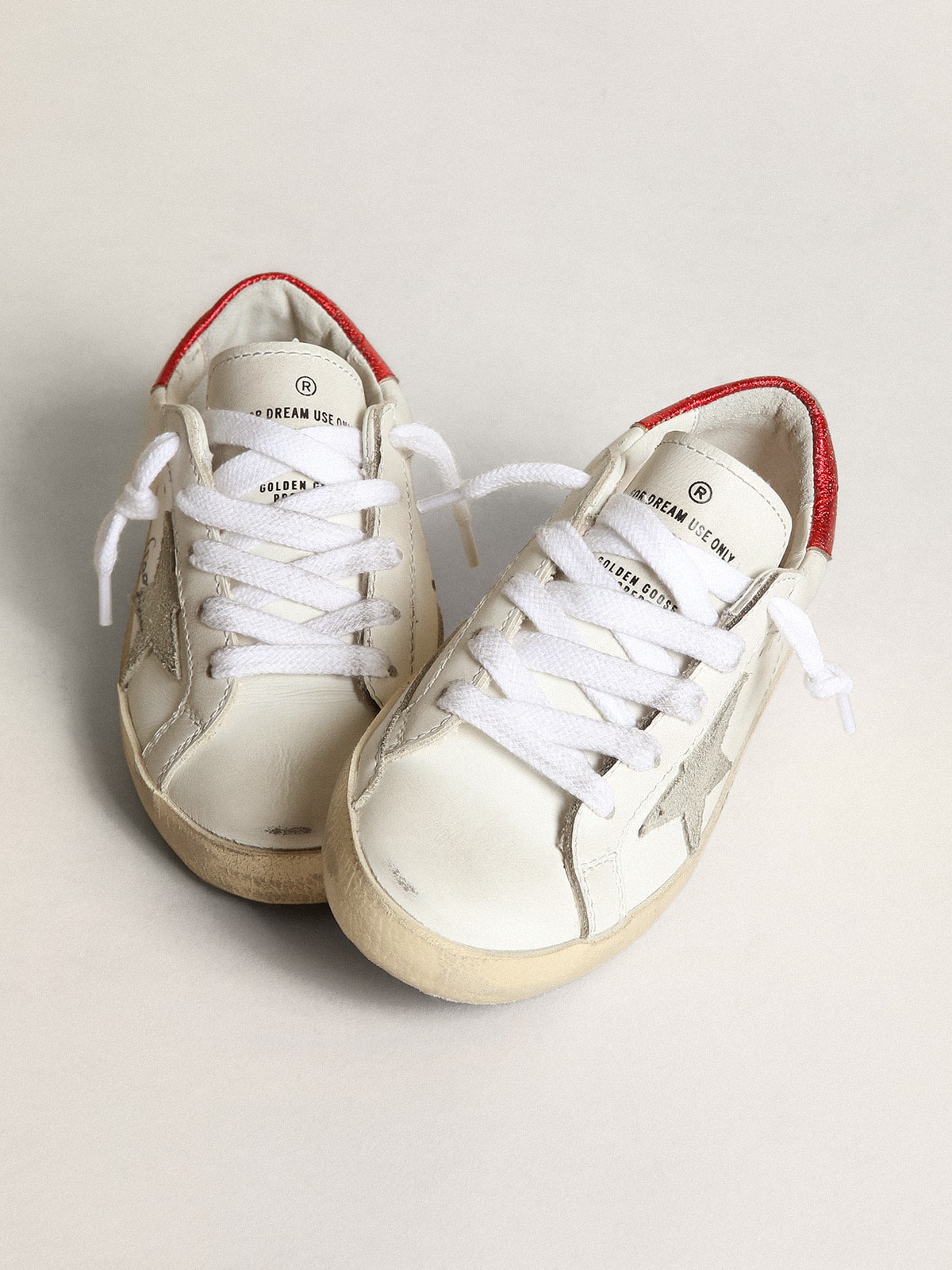 Young Super-Star with gray suede star