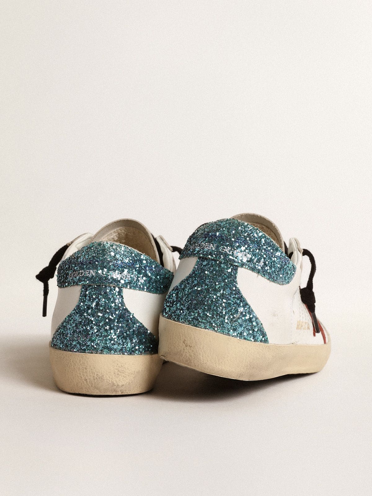 Women's Super-Star with burgundy suede star and light blue glitter heel tab