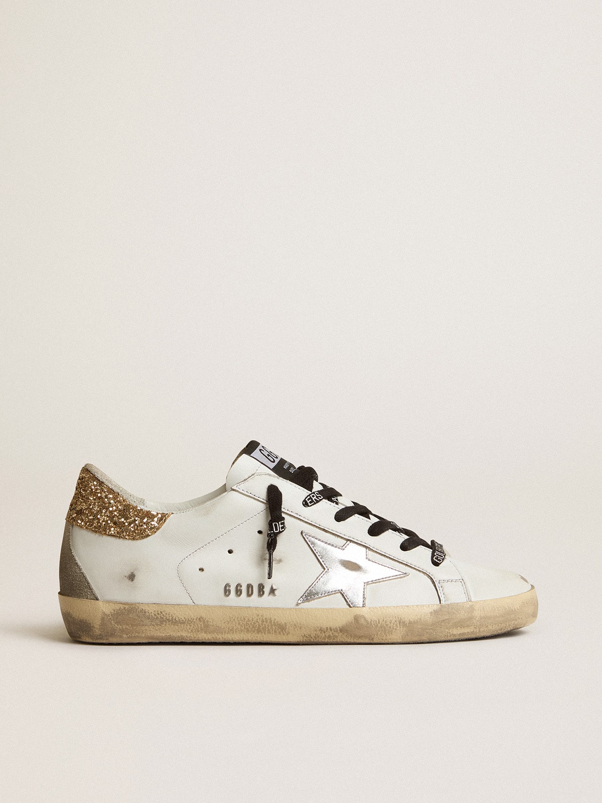 Women's white leather Super-Star with glittery heel tab