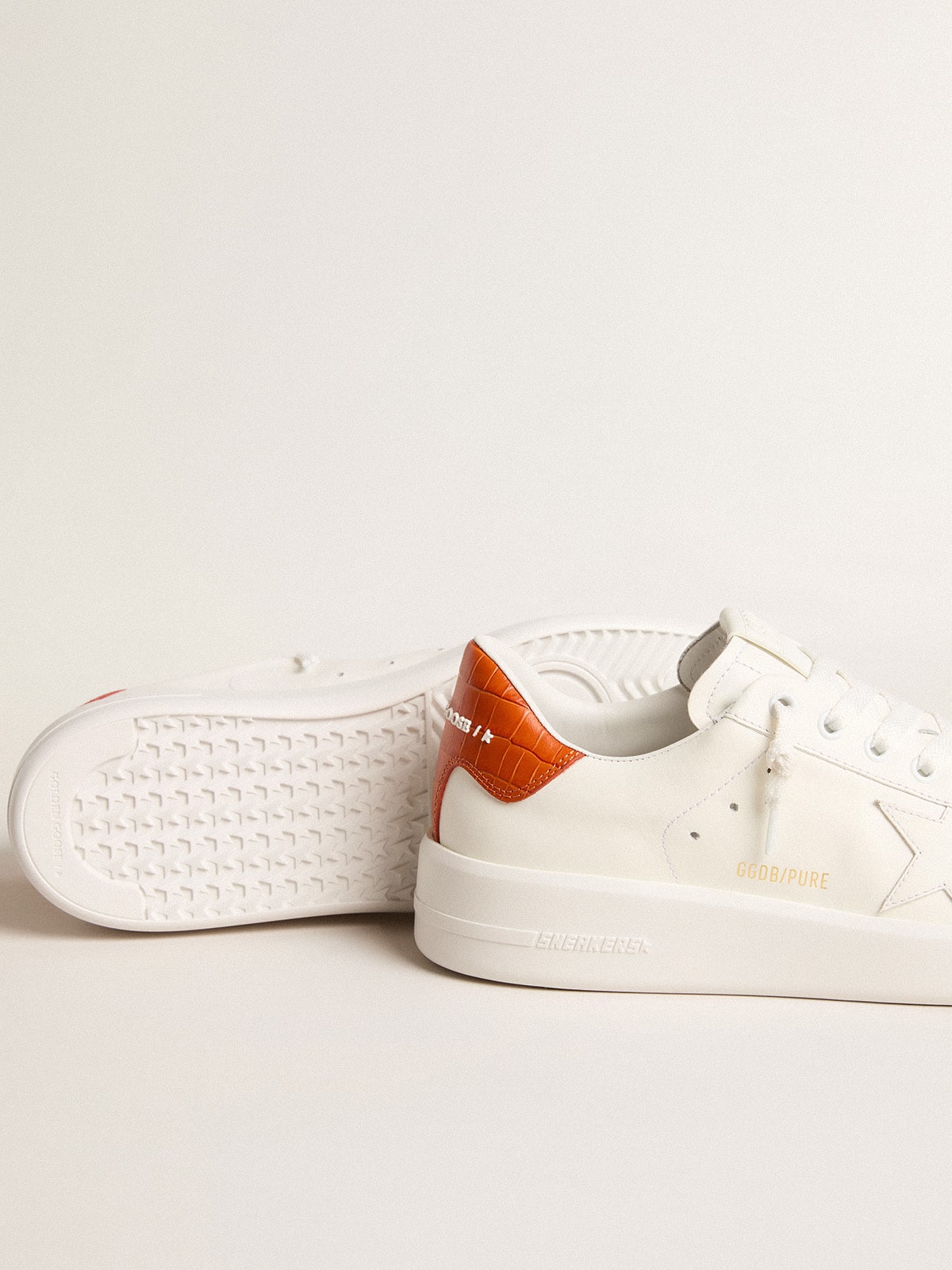 Women's Purestar with white leather star and orange heel tab