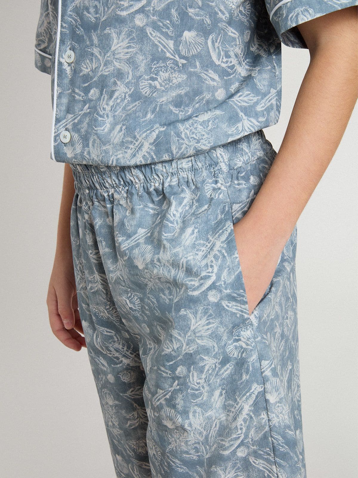 Boys' blue shorts with white print