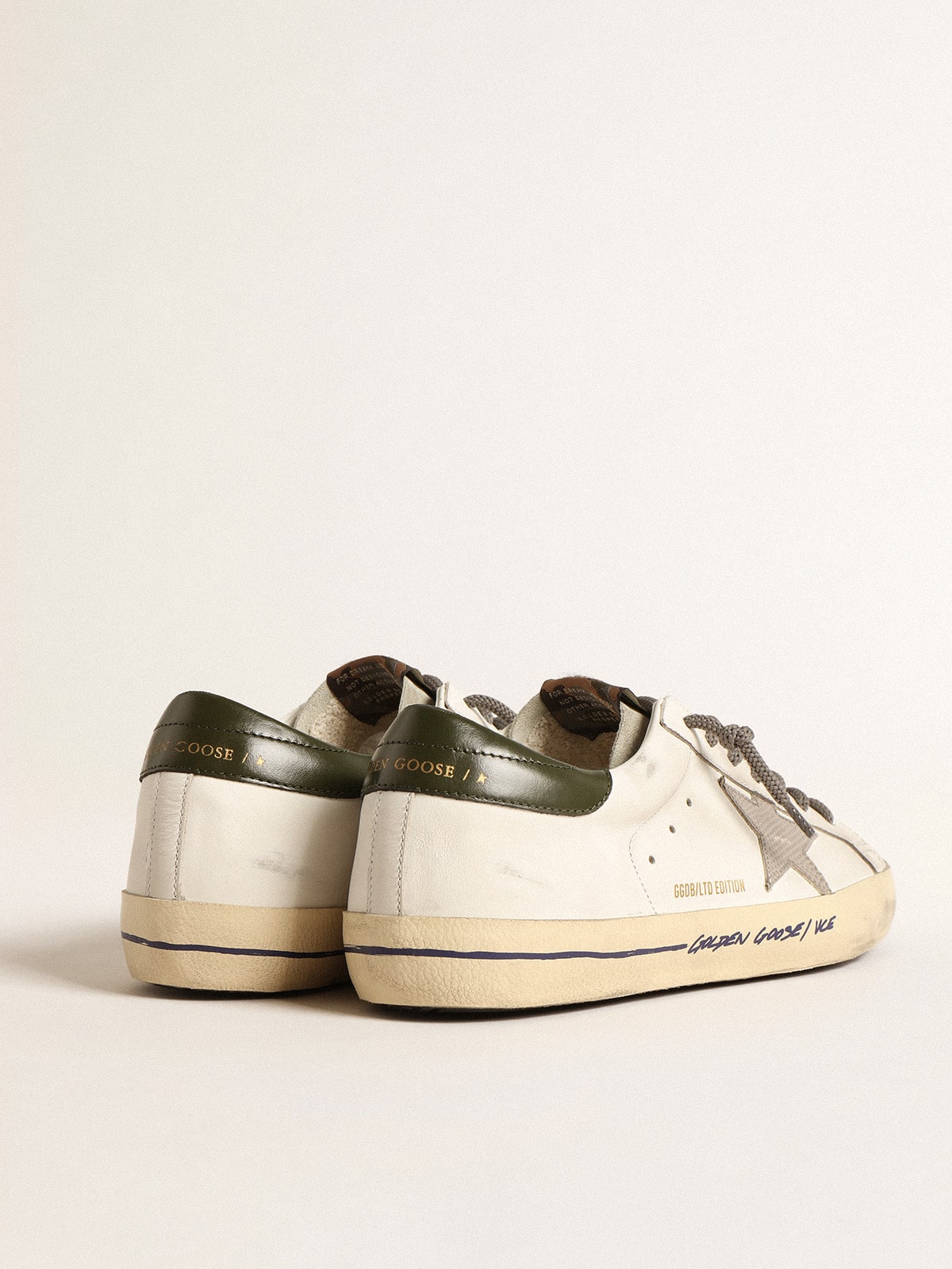 Super-Star LTD with croc-print star and green heel tab