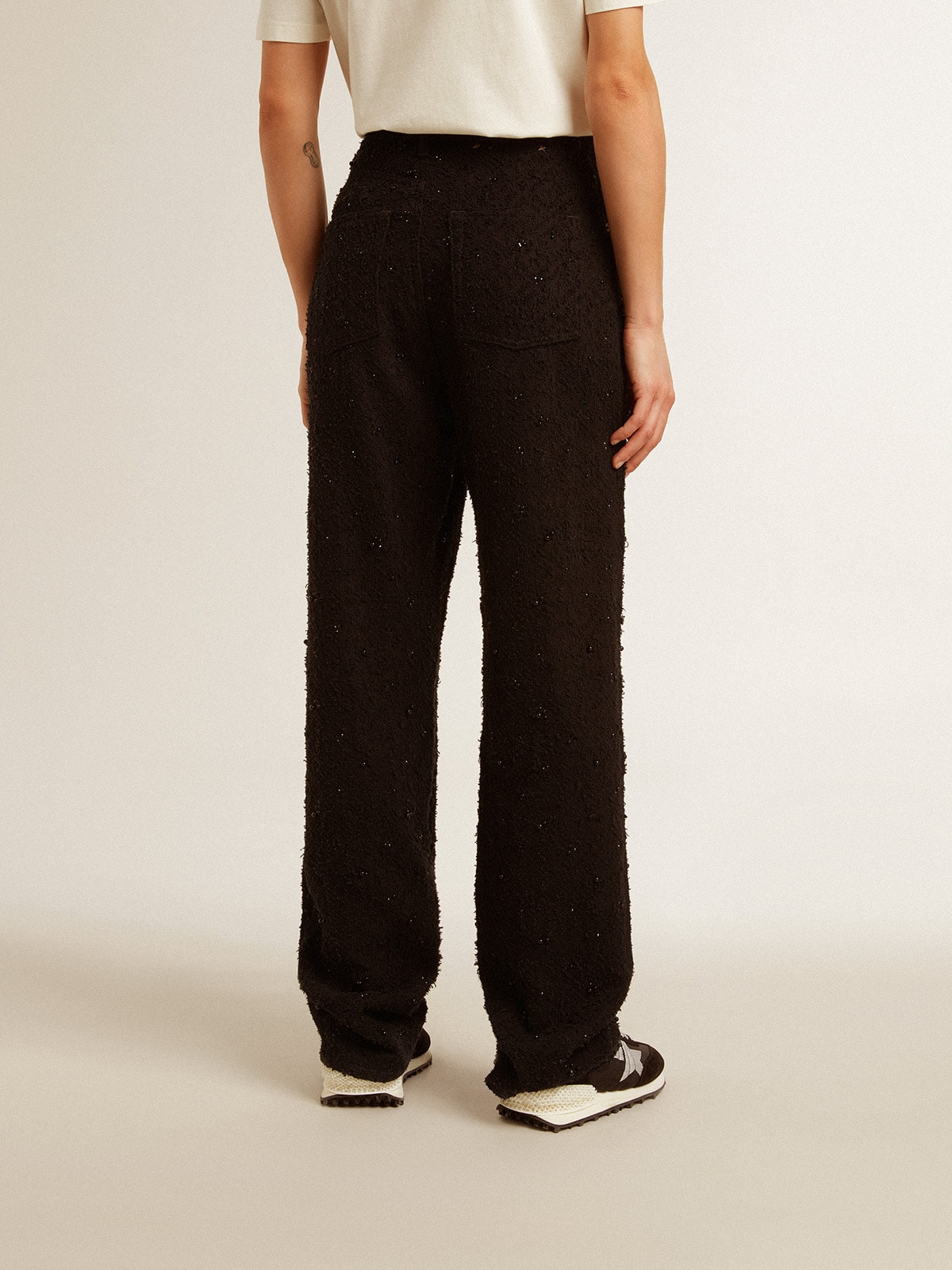 Women's cotton denim pants with crystal and stone decoration