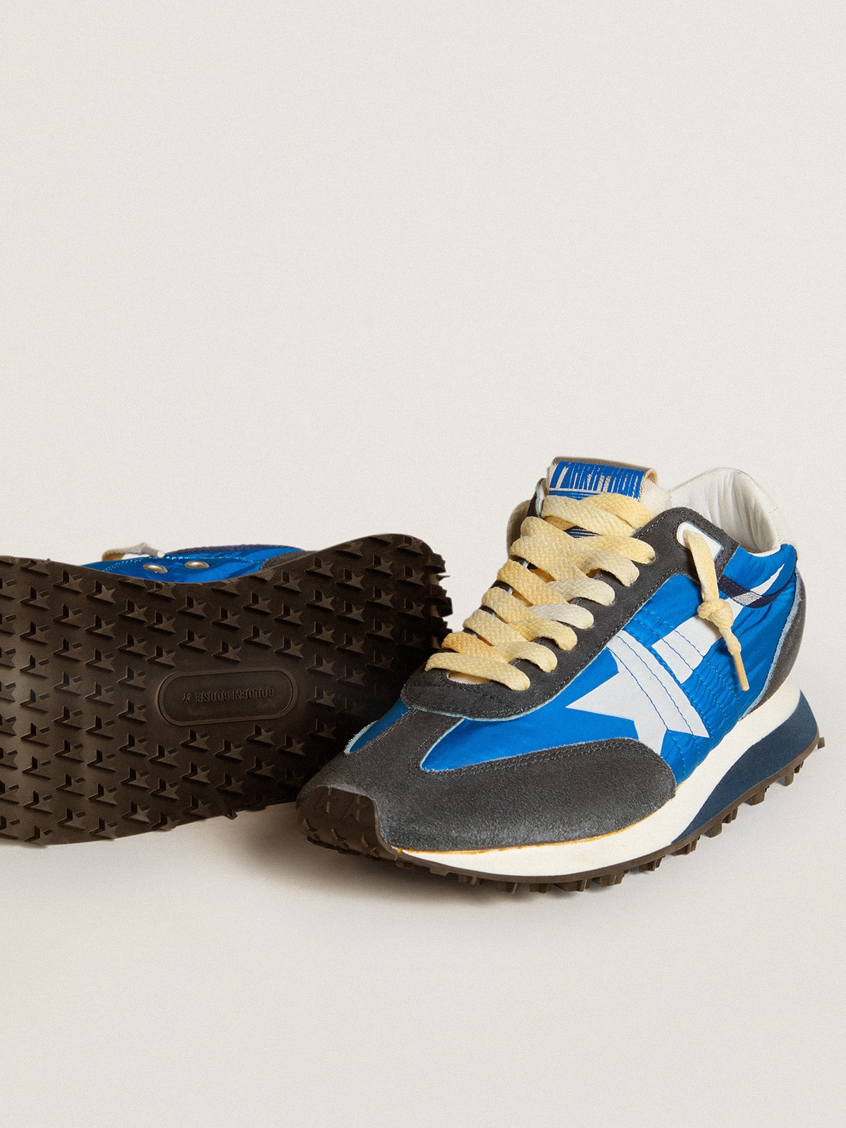 Women's Marathon with blue nylon upper and white star