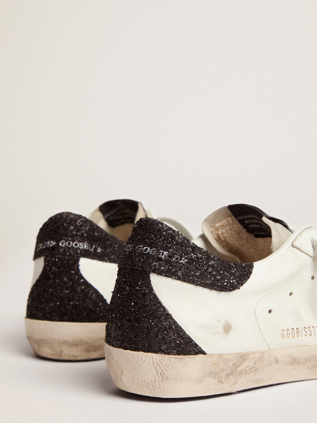 Women's Super-Star in nappa leather with gold glitter star and black glitter heel tab