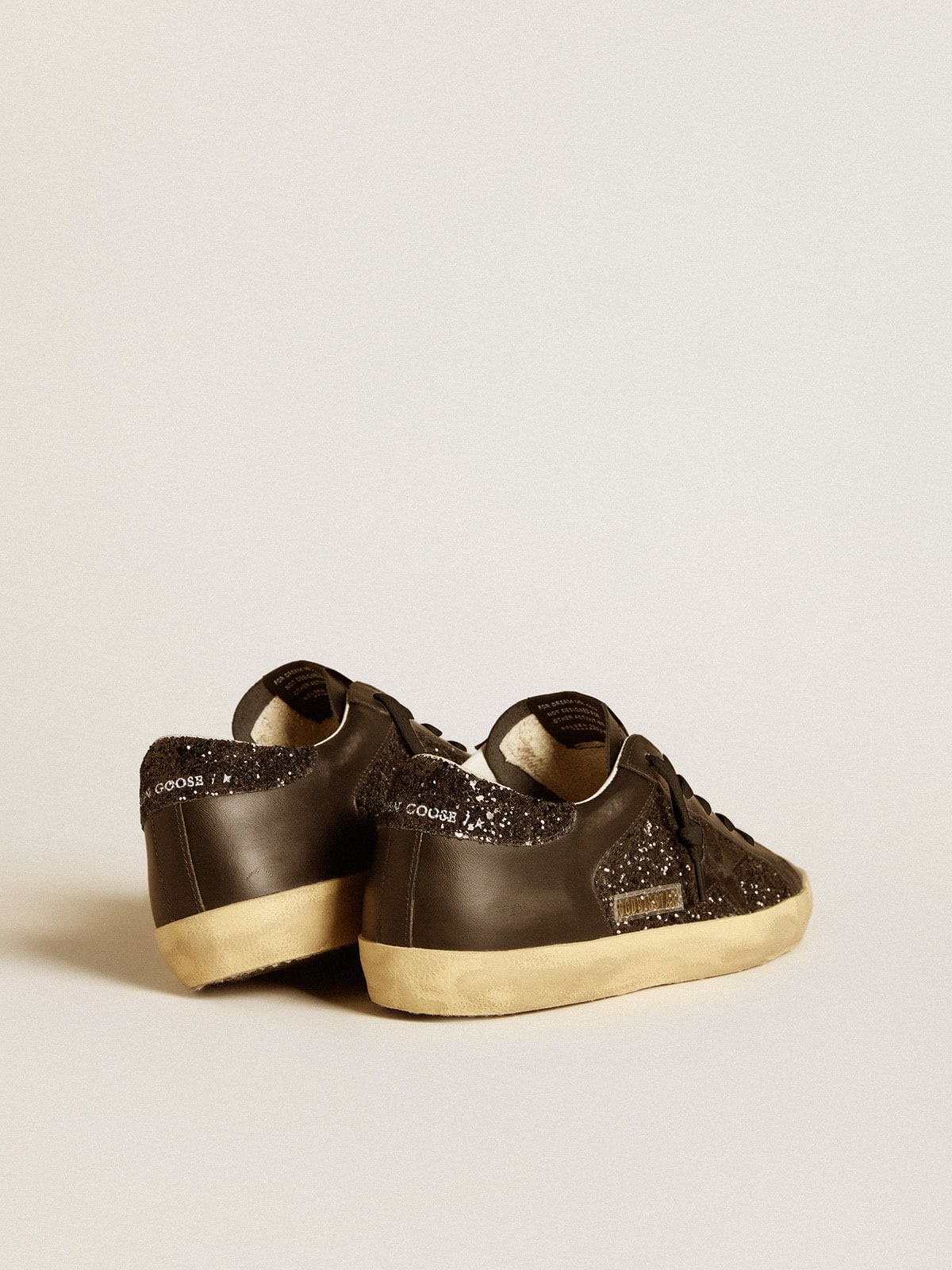Women's Super-Star in black glitter with black suede star and leather inserts