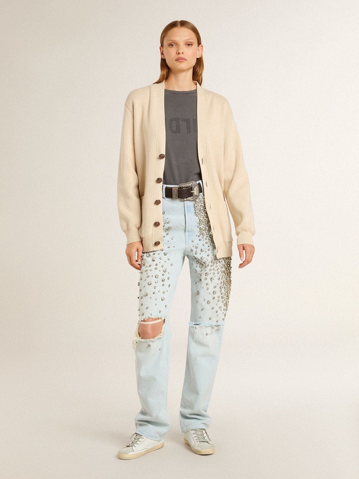 Women's beige cardigan with 'Golden' lettering on the back