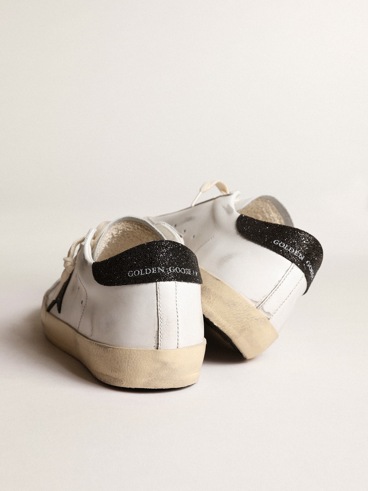 Women's Super-Star with a black Swarovski crystal star and heel tab