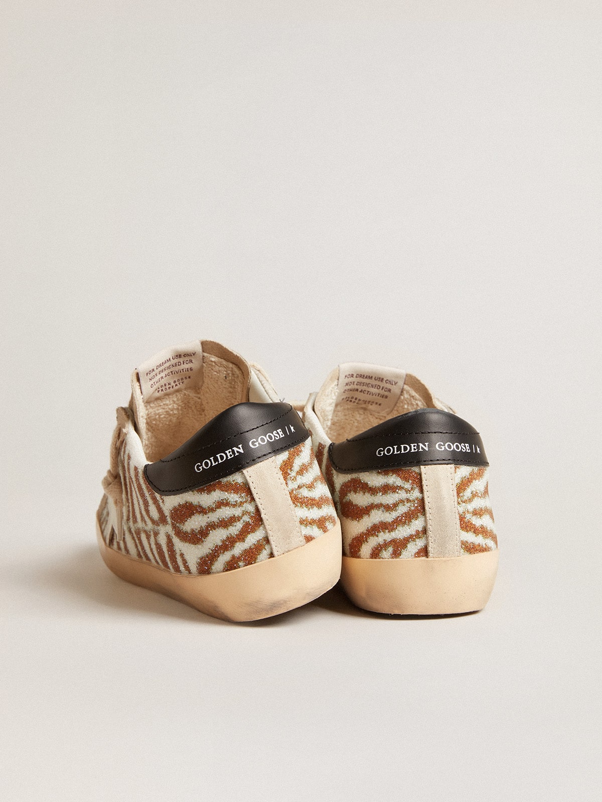Super-Star LTD in zebra-effect Swarovski with a white leather star