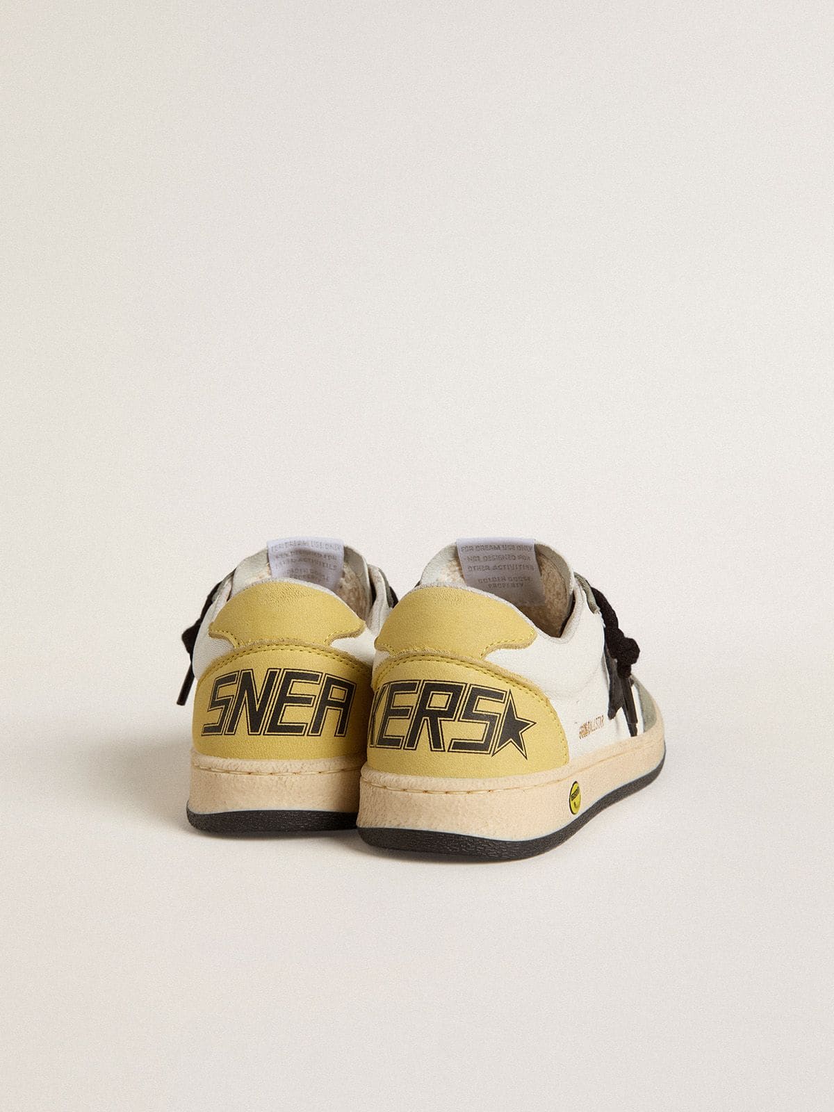 Ball Star Young in white nappa with dark green suede inserts and black star