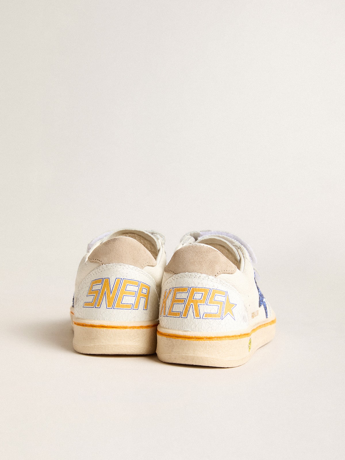 Junior Ball Star with blue glitter star and beige suede heel tab