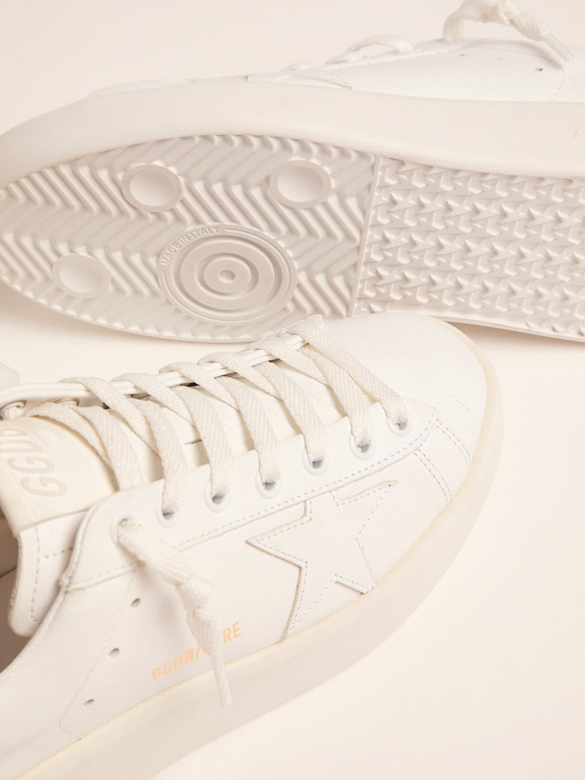 Women's Purestar sneakers with gold-coloured heel tab