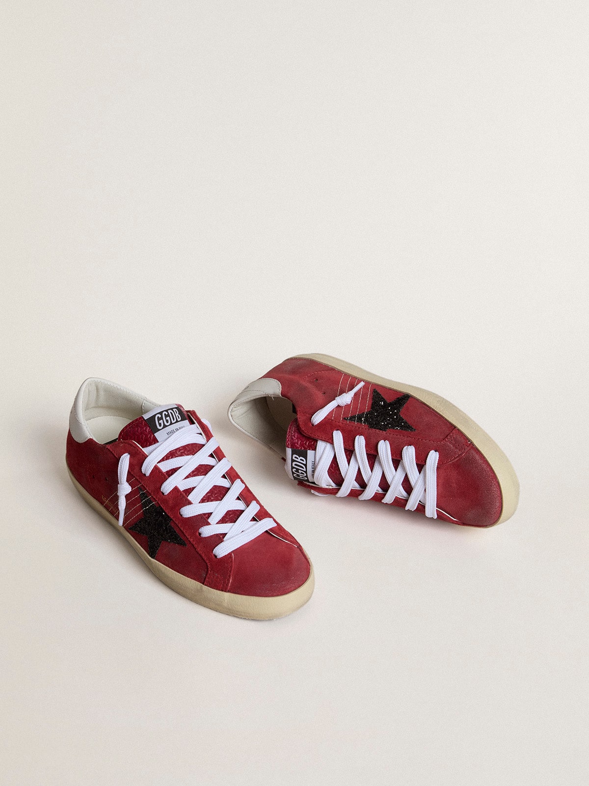 Women's Super-Star in red suede with glitter star and white heel tab