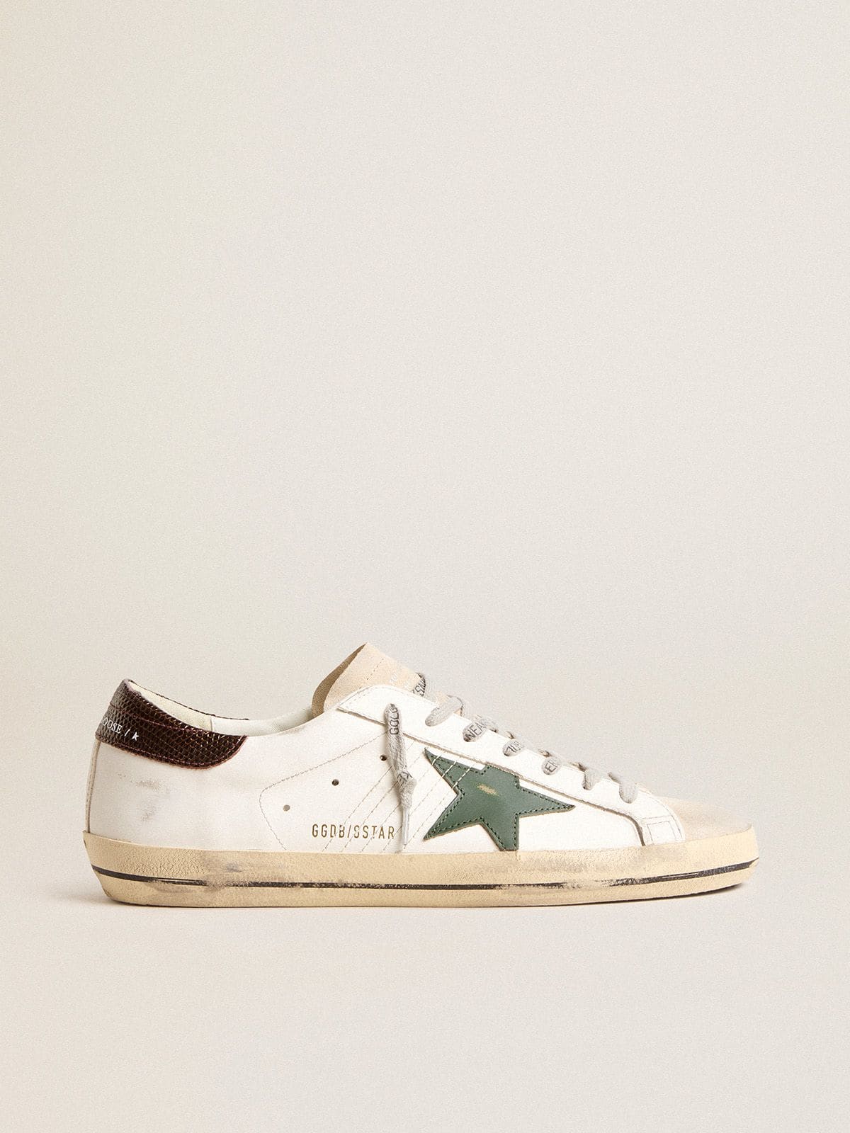 Men's Super-Star in white leather with green star and animal-print heel tab