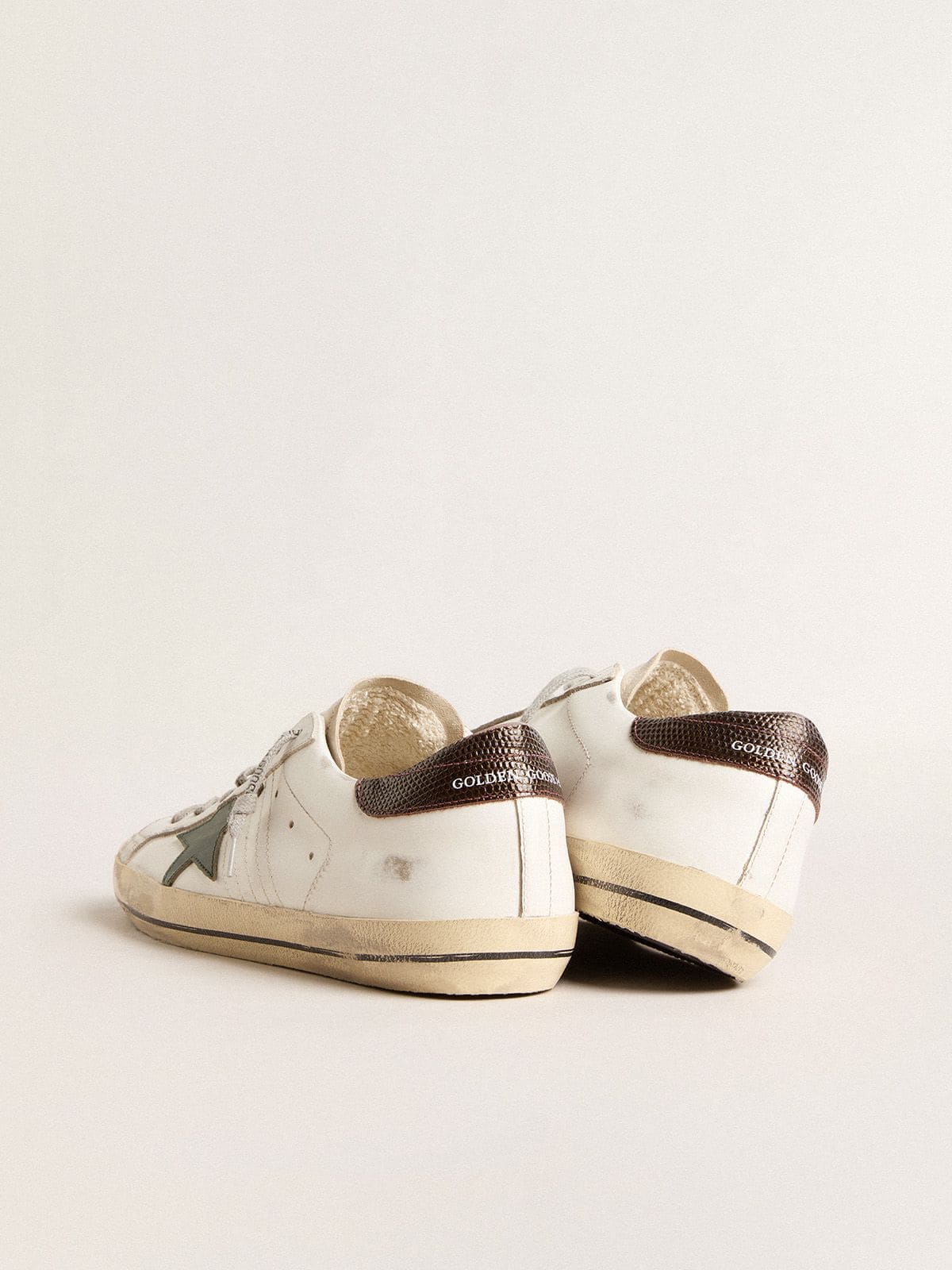 Men's Super-Star in white leather with green star and animal-print heel tab