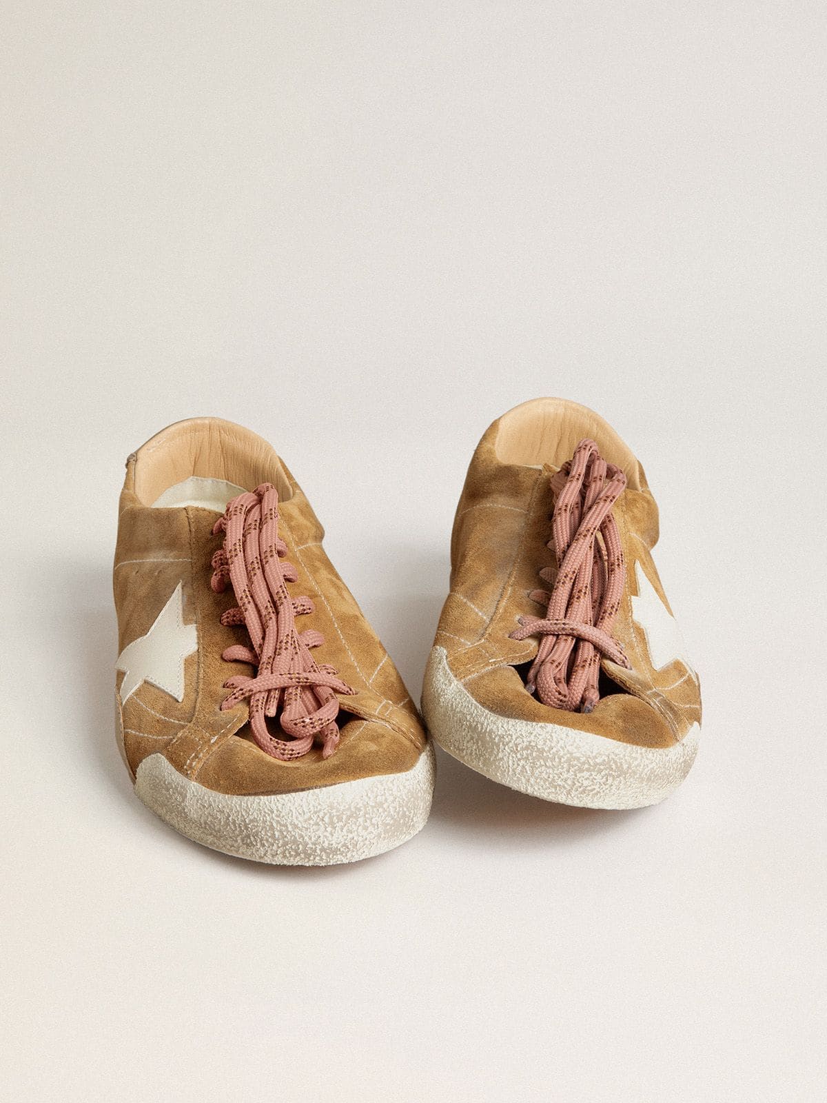 Men's True-Star in tobacco-colored suede with white star and platinum heel tab