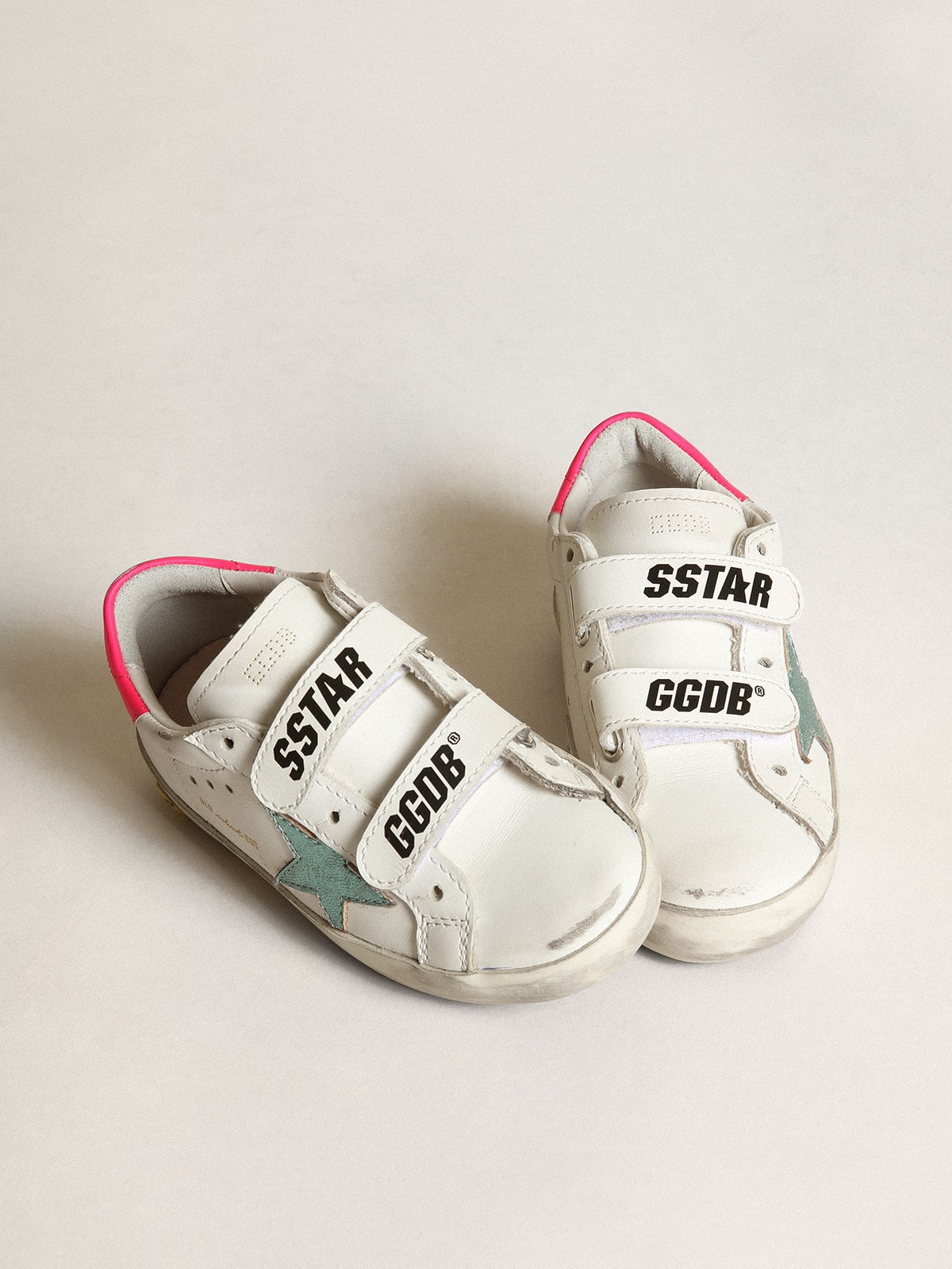 Young Old School with star in aquamarine laminated leather
