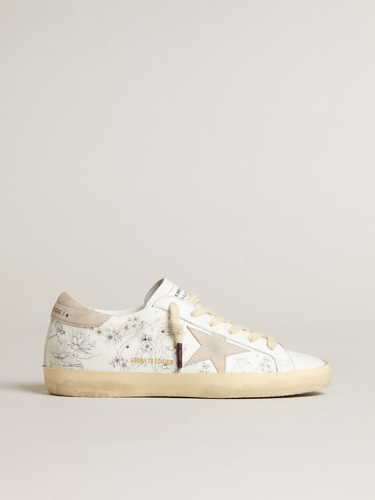 Women's Super-Star LTD CNY in white leather with lettering on the upper