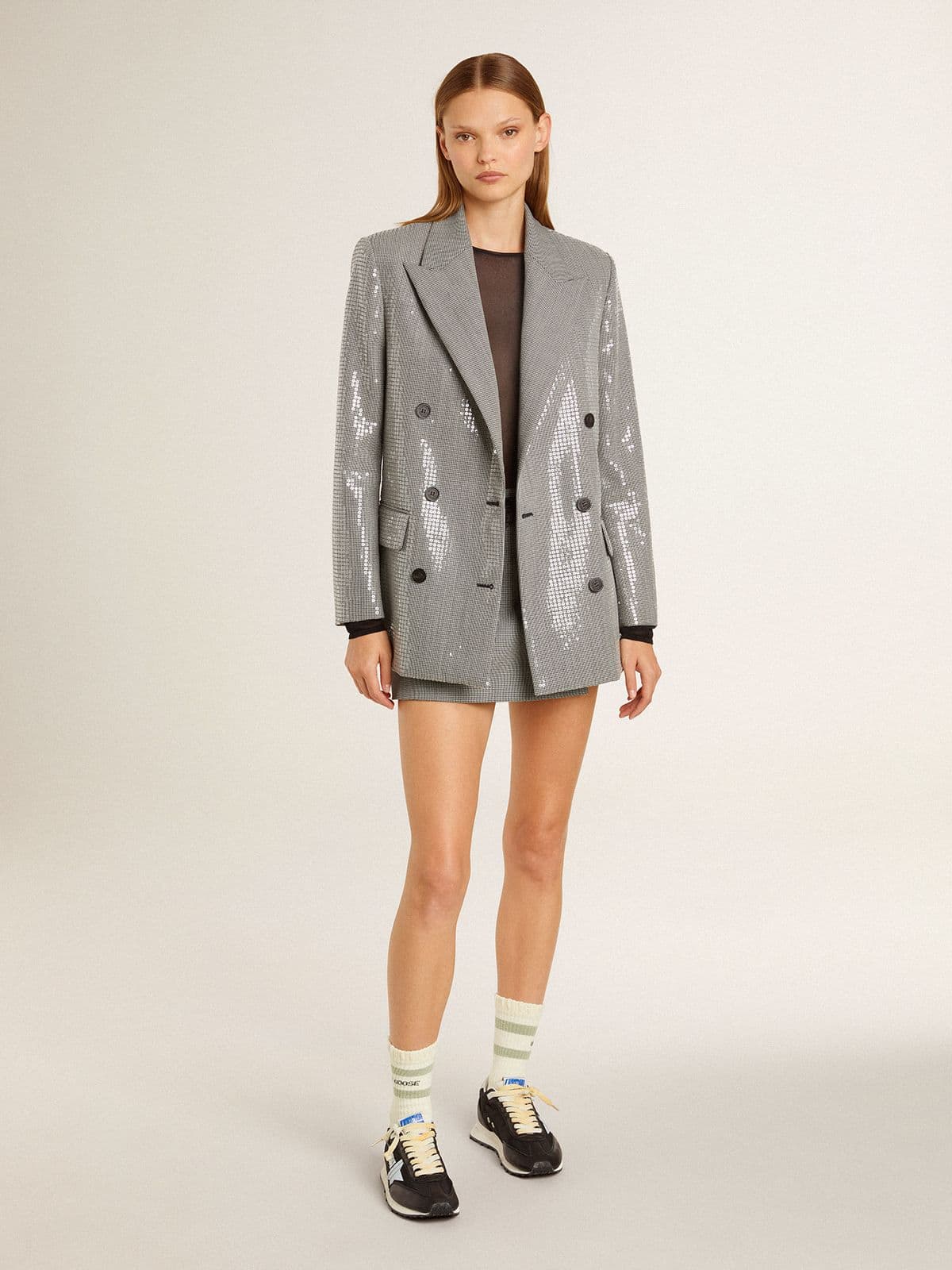 Worn-white socks with distressed details and sage-green stripes