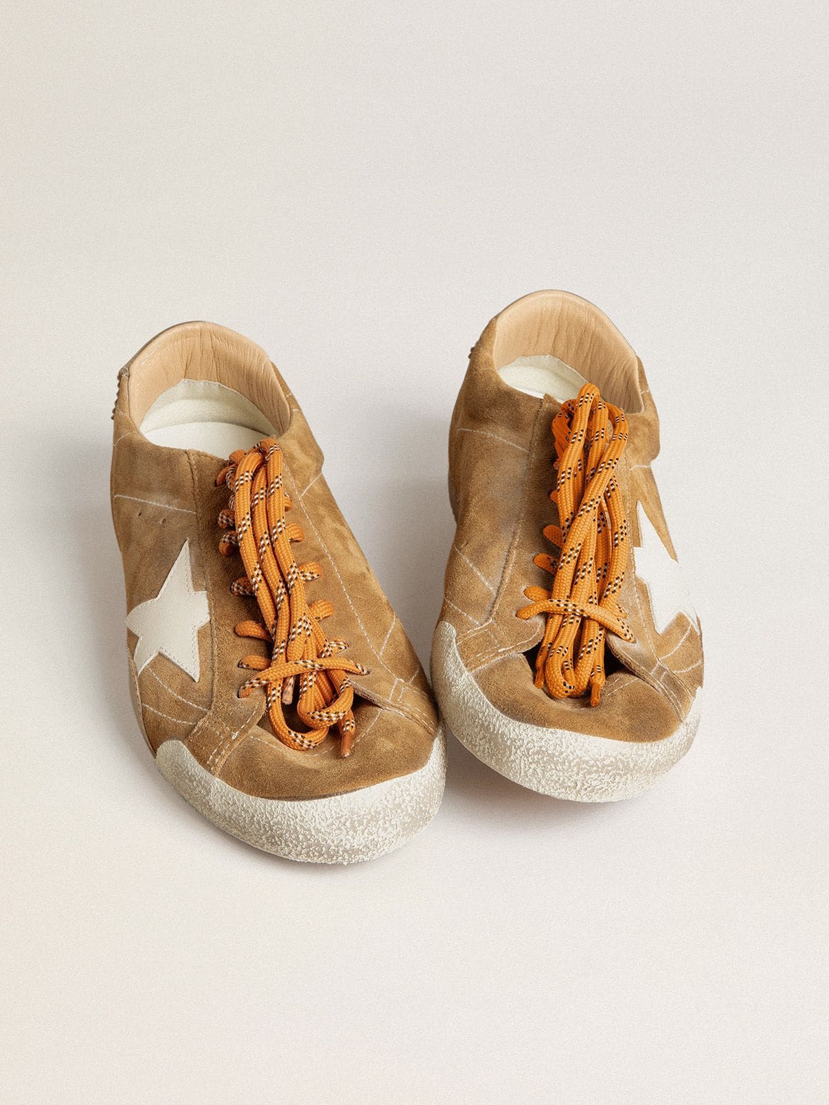 Women's True-Star in tobacco-colored suede with white star and platinum heel tab