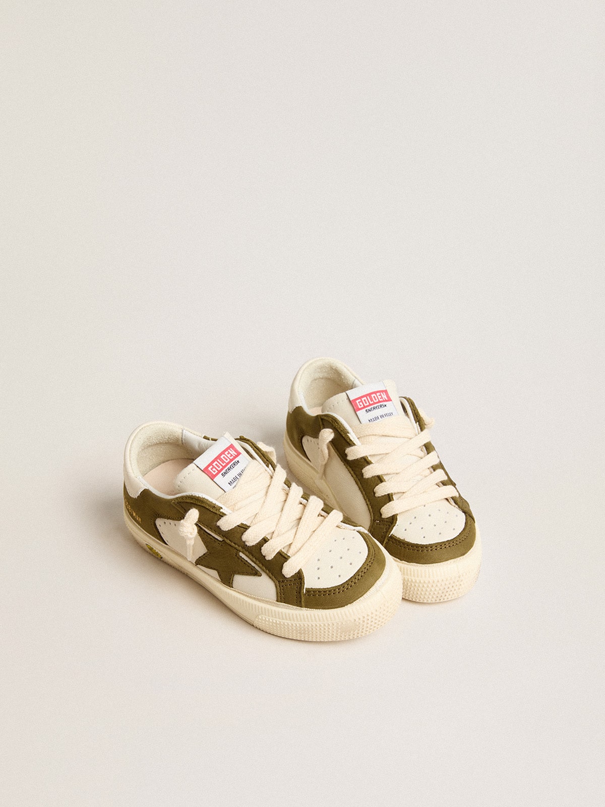 May Junior in white and military green leather