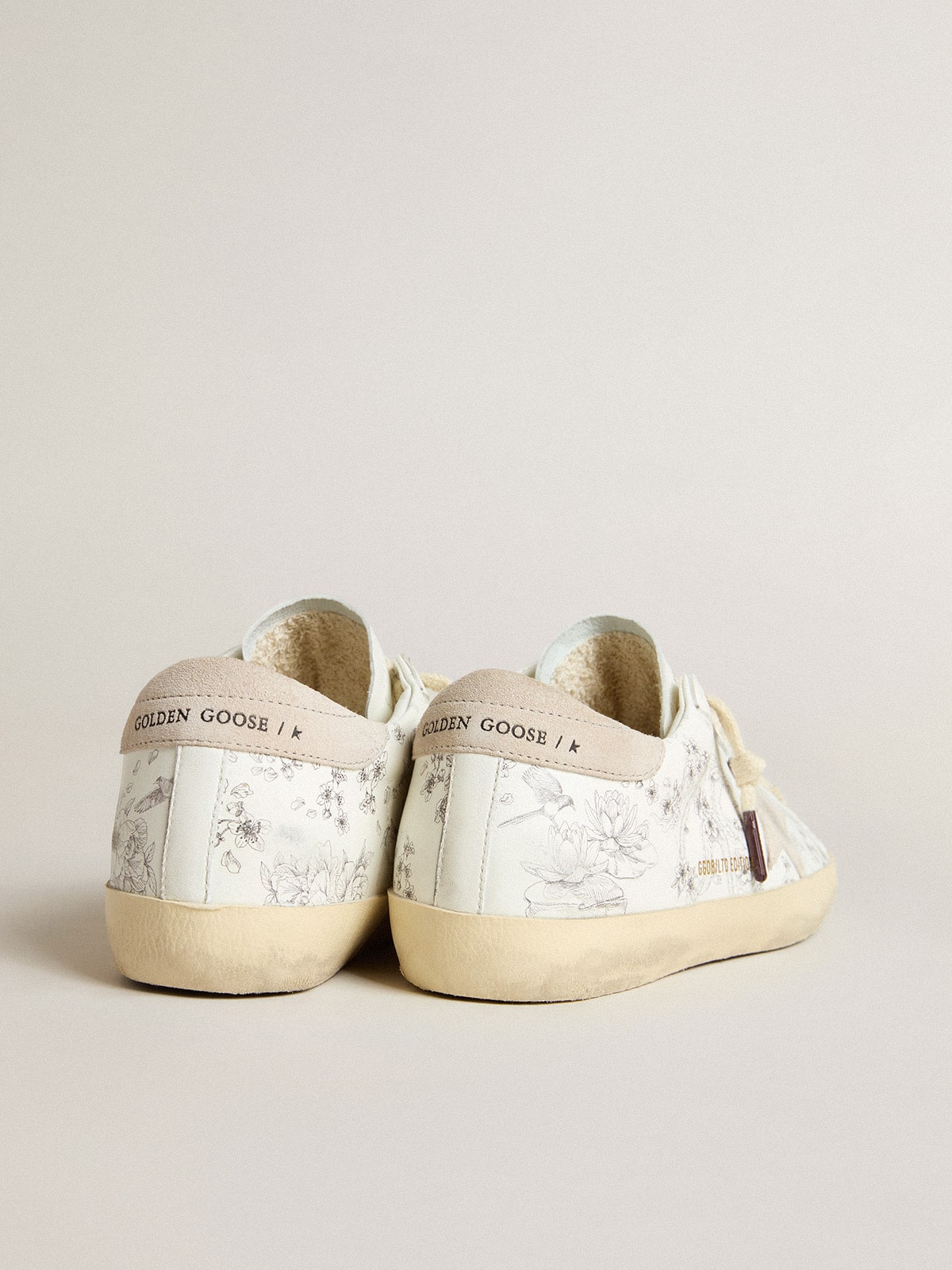 Women's Super-Star LTD CNY in white leather with lettering on the upper