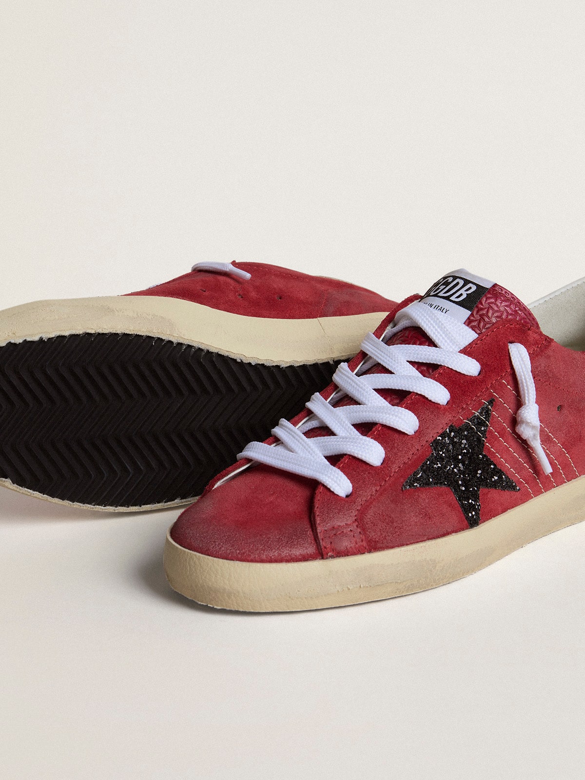 Women's Super-Star in red suede with glitter star and white heel tab