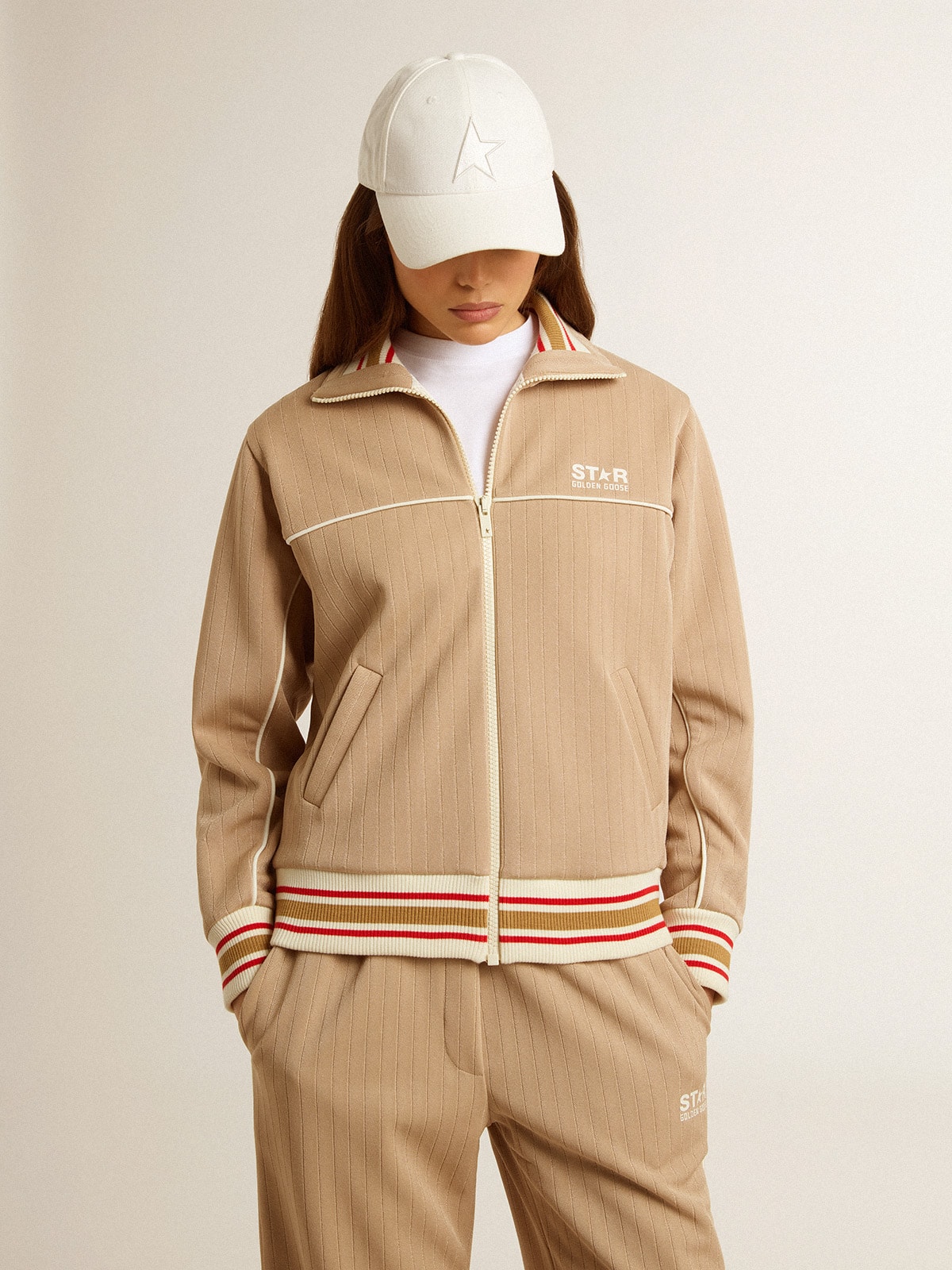 Women's light beige zipped sweatshirt with white logo