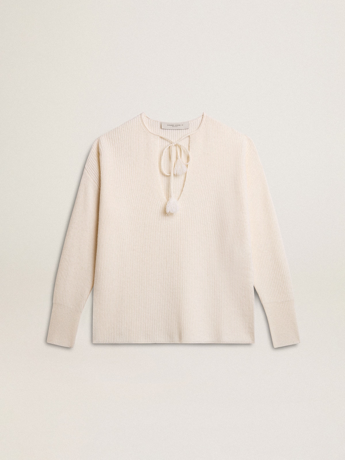 Ribbed wool sweater with V neck and drawstring with tassels